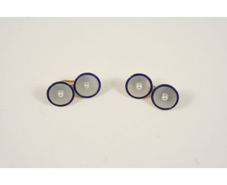 A PAIR OF EARLY 20TH CENTURY FRENCH ENAMEL AND MOTHER-OF-PEARL CUFFLINKS each mother-of-pearl circular disc is centred with a