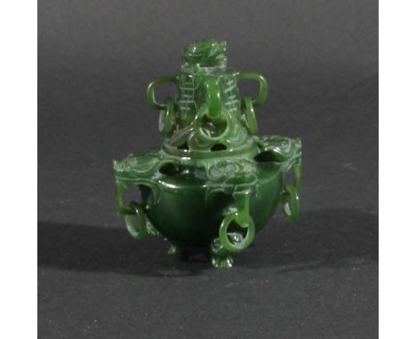 CHINESE SPINACH JADE CENSER AND COVER, with four dragon head handles, the cover with four handles and dog of fo finial, heigh