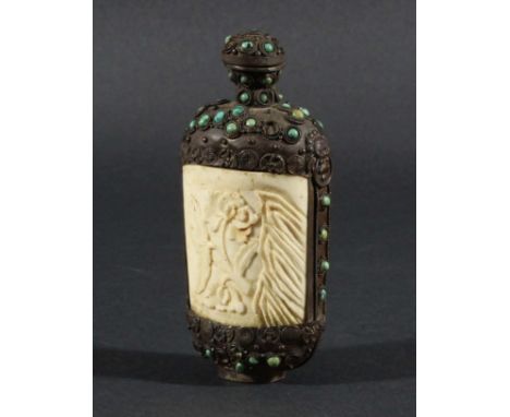 CHINESE SNUFF BOTTLE AND STOPPER, probably bone mounted in bronze with turquoise cabochons, height 11.5cm Provenance: Formerl