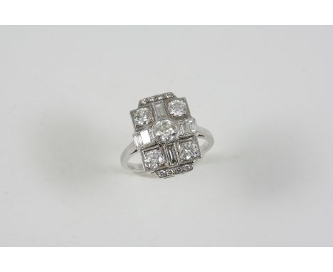 AN ART DECO STYLE DIAMOND RING set with baguette-cut and graduated circular-cut diamonds weighing approximately 1.85 carats i