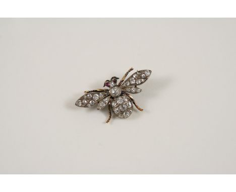 A VICTORIAN DIAMOND BEE BROOCH centred with a cushion-shaped diamond and set overall with graduated old brilliant-cut diamond