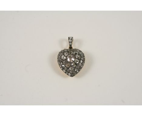 A DIAMOND HEART-SHAPED PENDANT millegrain set with cushion-shaped and circular-cut diamonds, in gold, 1.5cm. wide.