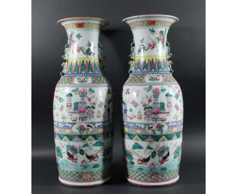 PAIR OF CHINESE FLOOR VASES, 19th century, with Canton style famille rose enamel decoration of vases and other ornaments abov