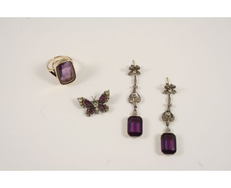 A PASTE SET BUTTERFLY BROOCH set with purple and white paste stones, 2.5cm. wide, together with a pair of purple and white pa