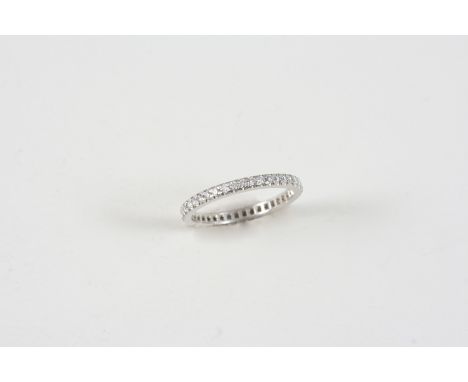 A DIAMOND FULL CIRCLE ETERNITY RING BY TIFFANY & CO. set with circular-cut diamonds in platinum. Signed Tiffany & Co., to the