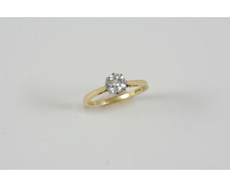 A DIAMOND SOLITAIRE RING the old brilliant-cut diamond weighs approximately 0.80 carats and is set in 18ct. gold and platinum