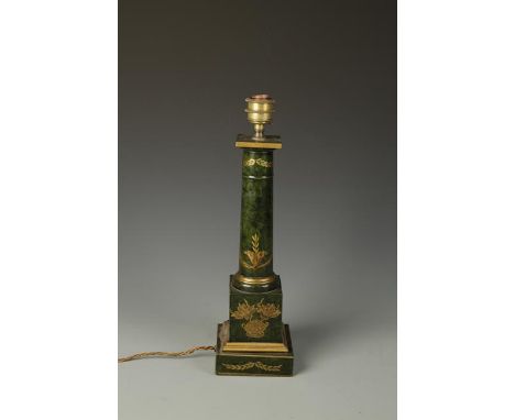 A JAPANNED METAL COLUMN FORM TABLE LAMP in the Regency style with gilt foliate decoration and square stepped base, 24.5" high