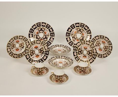 A ROYAL CROWN DERBY DINNER SERVICE of Imari pattern, pattern no. 2451, XLV, XLVI, XLIII. 12 place settings comprising 12 each