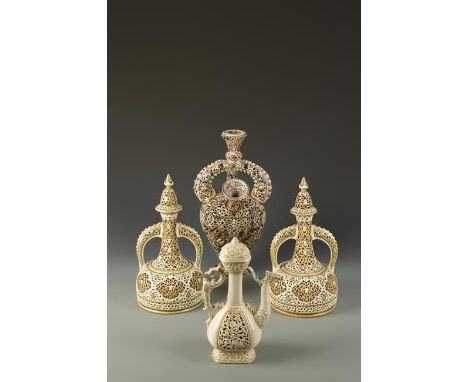 A PAIR OF ZSOLNAY RETICULATED PORCELAIN VASES with covers, decorated with yellow and gilt, on cream ground, gilt and impresse