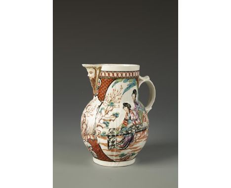 A WORCESTER BALUSTER-SHAPED CABBAGE LEAF MOULDED MASK JUG with scroll handle, painted in Chinese Mandarin style with iron red