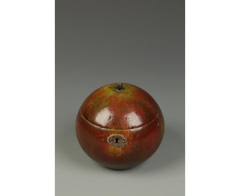 AN UNUSUAL AND POSSIBLY RARE FRUITWOOD APPLE FORM TEA CADDY with all over naturalistic painted finish with fine craquelure, 4