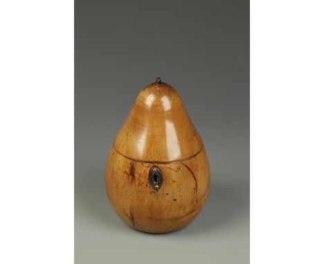 A PEARWOOD TEA CADDY in the form of a pear, 18th century, 6.5" high. See illustration