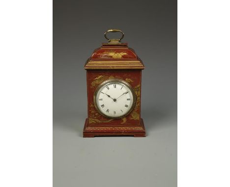 A CHINOISERIE MANTEL CLOCK with a circular convex dial with Roman numerals in a red lacquer case with pagodas and landscape d