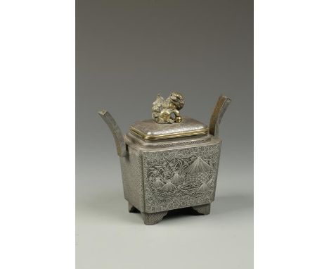 A JAPANESE SILVER-INLAID IRON KORO of tapering rectangular form with canted corners and flared handles, the cover with a shis
