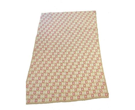 A TAPESTRY PANEL, the pale grey ground worked with stylised red and leaf pattern hexagonal motifs, 106" x 74"