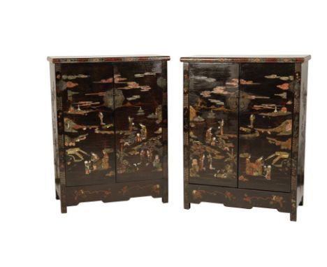 A PAIR OF CHINESE BLACK LACQUER HARDSTONE INLAID TWO DOOR CABINETS, the doors decorated with figures amongst stylised landsca