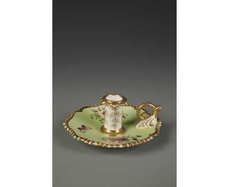 A FLIGHT BARR & BARR WORCESTER MINIATURE CHAMBER CANDLESTICK with flower and butterfly decoration on a green and gilt ground,