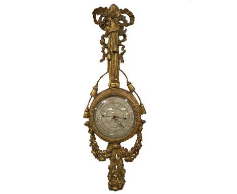 A LOUIS XVI FRENCH GILTWOOD BAROMETER, the dial signed "Radiguet, 15 Boulevard des Filles, Paris", the circular barometer wit