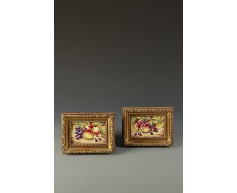A PAIR OF PAINTED CERAMIC PLAQUES by T. Nutt, in gilt frames, 3.5" x 5.5" (2)