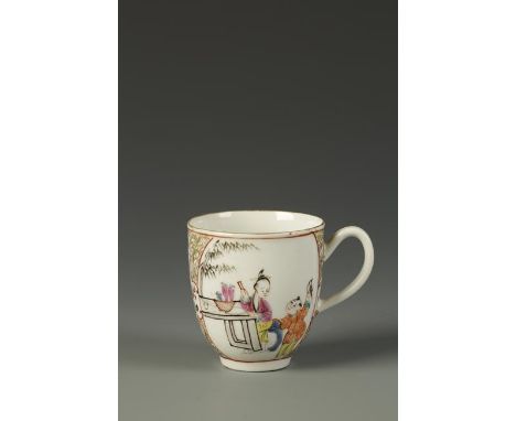 A WORCESTER COFFEE CUP painted in the Chinese famille rose style with figures at at a table in a garden, within gilt and pain