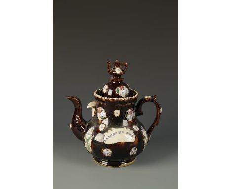 A LARGE MEASHAM POTTERY BARGEWARE TEAPOT AND COVER with a coffee pot finial, and polychrome painted floral decoration on a tr