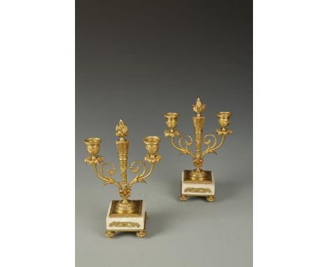 A PAIR OF NAPOLEON III STYLE GILT METAL AND MARBLE MOUNTED TWIN LIGHT CANDELABRA, late 19th century, 10.5" high