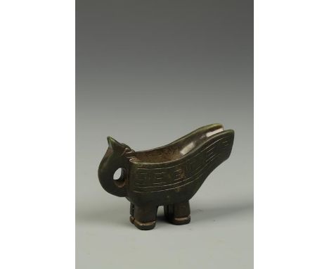 A CHINESE DARK GREEN JADE MINIATURE JU-FORM EWER, with a dragon handle and engraved sides, late Ming-Qing, 3.75" long