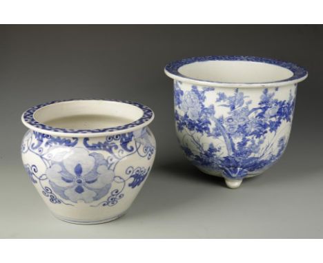A LARGE JAPANESE BLUE AND WHITE TRIPOD JARDINIERE decorated with birds and flowers, Meiji, 14.5" dia.; and a smaller Chinese 