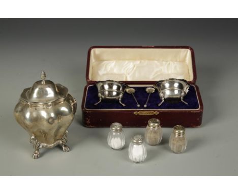 A PAIR OF SILVER TABLE SALTS AND SPOONS, in fitted box, hallmarked for Birmingham 1906, a similar tea caddy and a christofle 