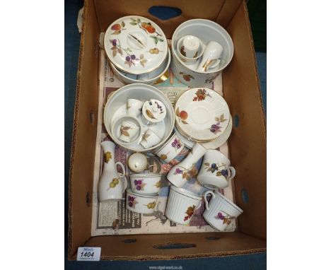 A quantity of Royal Worcester Evesham tableware to include souffle dishes, condiments, egg cups, cups and saucers, etc.