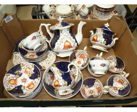 A Gaudy Welsh tea service to include; 12 cups, 15 saucers, teapot, sucrier, milk jug, bread & butter plate - some in good con