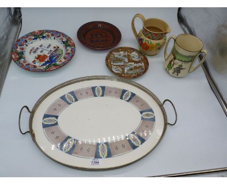 A quantity of china including floral Wedgwood jug by Milly Taplin, two handled Royal Doulton golfing mug (crazing), Royal Wor