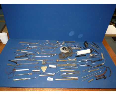 A quantity of vintage medical instruments/equipment, tweezers, etc., possibly dentistry, etc.,