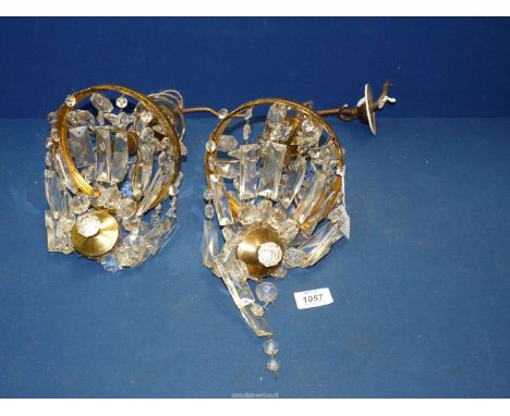 A pair of early 20th Century circular gilt brass and drop crystal ceiling light fittings. 6" diameter.