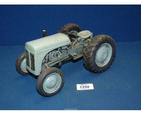 A grey 'Fergie' model Tractor, 4 1/2" x 10".