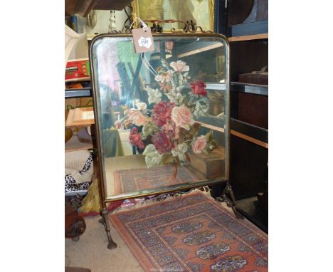 A mirrored Firescreen having painted red and pink roses, signature G. Bourter, 19" wide x 27" high.
