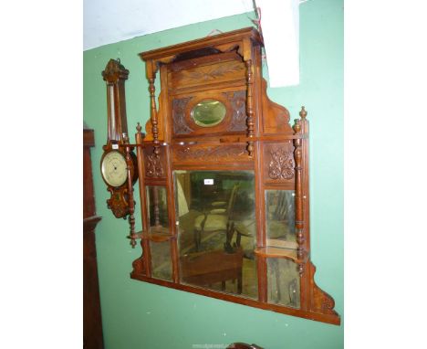 A probably Edwardian Mahogany framed Overmantel Mirror with turned supports, four rectangular bevelled mirrors and a small ov