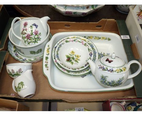 A quantity of Royal Worcester 'Worcester Herbs' china including large rectangular dish, flan and souffle dishes, cream jug, m