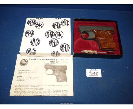 A boxed "EM-GE" starting/cyclist's dog-scaring blank-firing pistol for use with 6 mm calibre blank cartridges. Complete with 