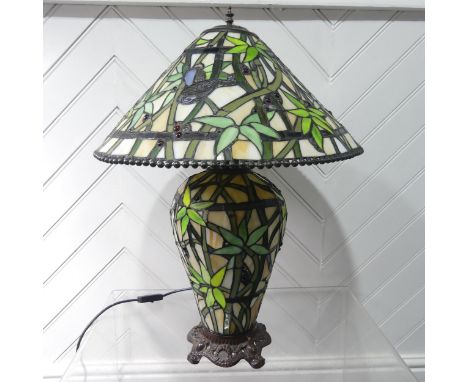 An Art Deco Tiffany &amp; Co style stained glass Lamp, the glass shade and body with stylised bamboo and birds, note, dent to