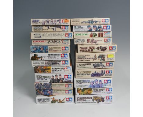 Twenty-three Tamiya 1:35 Scale Plastic Military Models, including No.224 Schwimmwagen Type 166, No.102 German 20mm Flak38 Mit