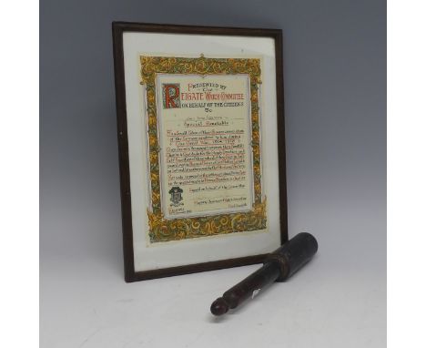 An early 20th century treen Police Baton, L 29 cm, together with a possibly related early 20th century document, presented to