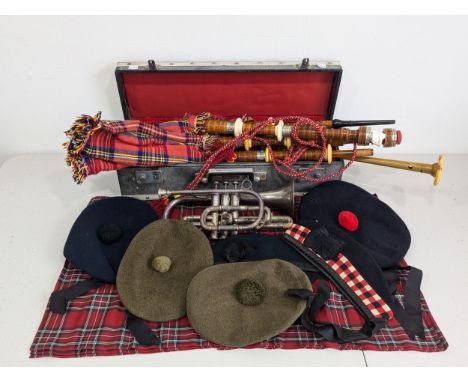 A set of Scottish Bagpipes, in case, together with six Scottish Highland Glengarry Caps, and a  silver plated Besson 'New Sta