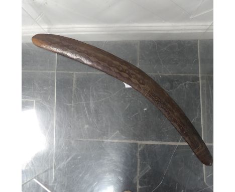 An early 20thC&nbsp;Australian Aboriginal Fighting Club&nbsp;Boomerang, one side with carved geometric and star decoration, 5