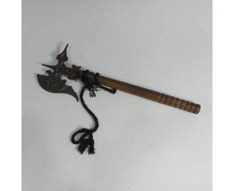 An 18th century style Chinese ceremonial Axe, decorated with dragon, with later turned handle, L 47 cm.