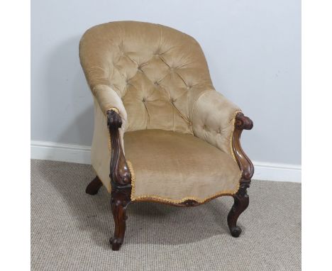 A Victorian mahogany upholstered button-back Armchair, with scrolled armrests and supports, W 62 cm x H 84 cm x D 78 cm, toge