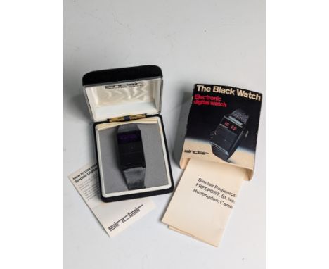 A Sinclair 'The Black Watch' electronic Digital Watch, boxed with outer card slip case,&nbsp;strap discolouring, requires a b