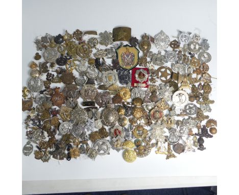 A large collection of Victorian, WW1, WW2, and later Cap Badges, mostly Scottish, including; Perthshire Light Infantry, Argyl