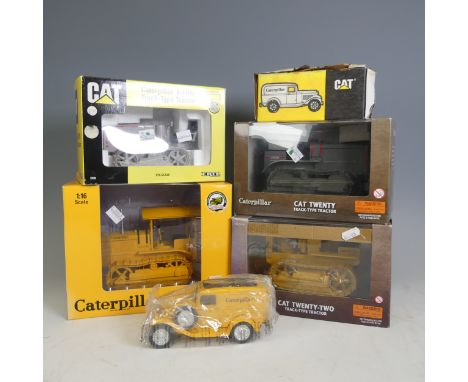A Caterpillar Twenty-Five Tractor, 1:16 scale by die-caster masters in original box with plastic housing, together with 3 oth