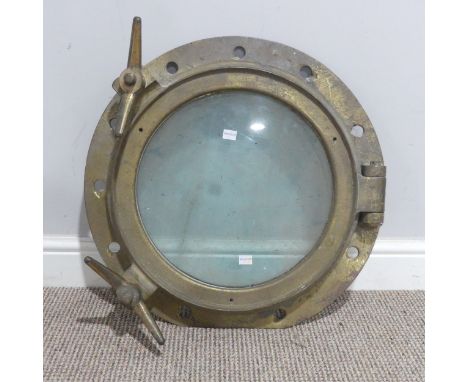 A 20th century brass ships Porthole, from the HMS Ark Royal 1955-1978, manufactured by John Roby Ltd, serial number M4/32, wi